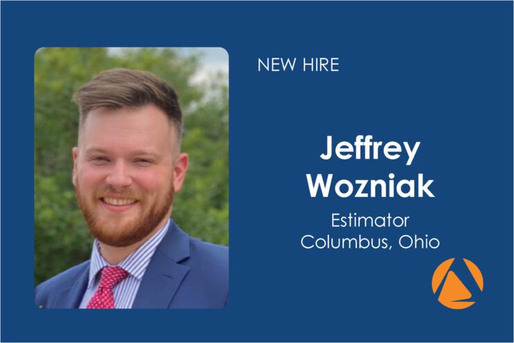 Image of a new hire announcement for Jeffrey Wozniak. The left side shows a smiling person with a beard wearing a blue suit, pink tie, and a white and blue striped shirt, with a green outdoor background. The right side, on a blue background, displays text: 'NEW HIRE', 'Jeffrey Wozniak', 'Estimator', 'Columbus, Ohio', along with an orange logo at the bottom.