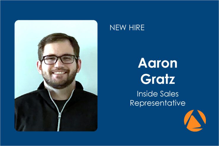 New Hire Inside Sales Representative | Air Control Products A promotional image for a new hire featuring a smiling man with glasses and a beard, wearing a black jacket. The background is blue with white text that reads 'New Hire Aaron Gratz Inside Sales Representative' beside an orange logo.