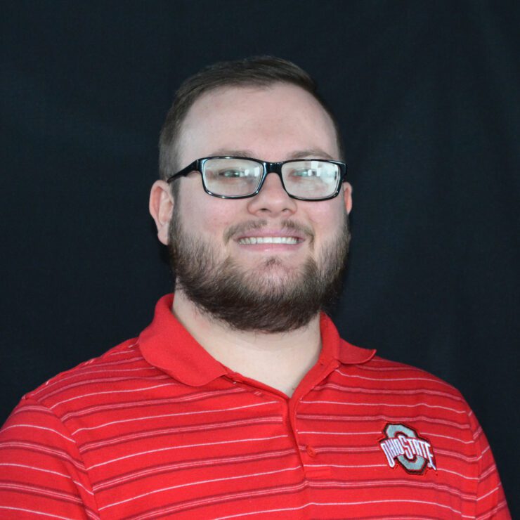 Smiling Man In Red Striped Shirt On Black Background | Air Control Products Tristen Brown, COlumbus Ohio